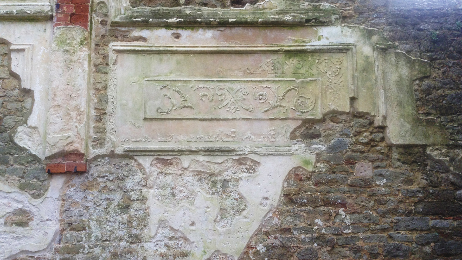 Conservation repairs to plaster relief at Cowdray Ruins