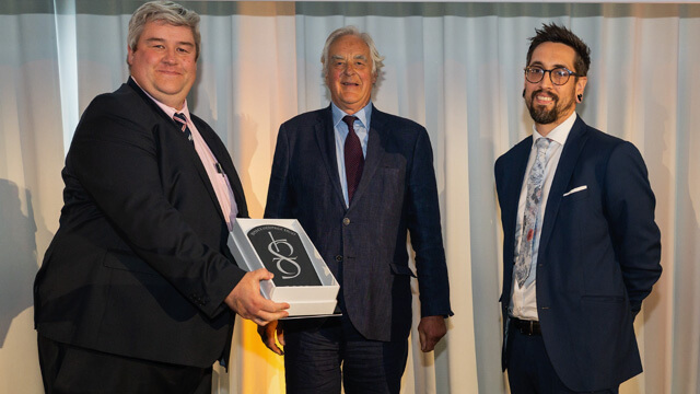 Lord Egremont presents the winners plaque to Julian Vallis and Laurence Hall at the Sussex Heritage Trust Awards 2025
